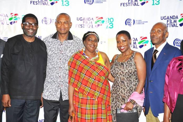 Minister for Gender, Mary Karooro Okurut (C), poses with the festival jury and UCC officials at last year's UFF.