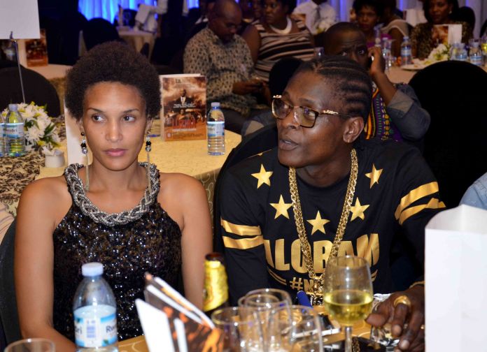 Singer Chameleone, seen here at the premiere with his wife Daniella, was given a cameo role in the film as part of a marketing gimmick to make it more appealing to Ugandans. 