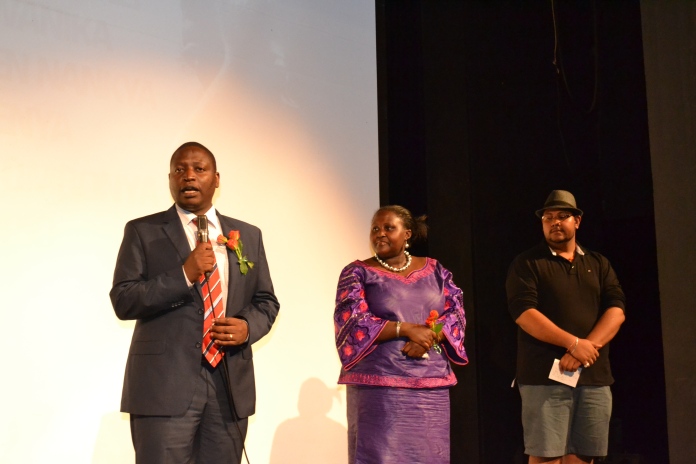 (L-R) Ndorwa West MP David Bahati, Kabale woman MP Ronnah Ninsiima and the day's emcee, filmmaker Jayant Maru.