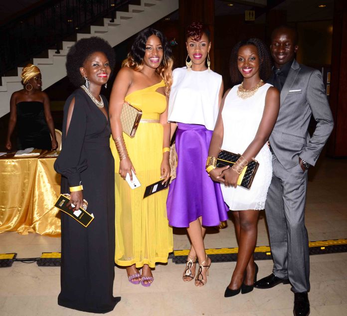 (L-R) Nana-Macpherson, Natasha Sinayobye, Deedan Muyira, Flavia Tumusiime and Daniel Omara at a social event recently.